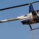 Illustration for article titled Helicopter Drops 955 Hot Dogs Over Detroit
